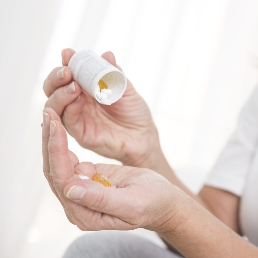 close-up-woman-with-medicine-bedroom
